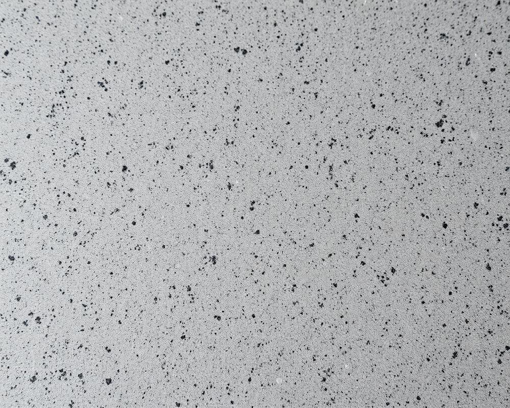 Close-up texture of a honed matte granite surface
